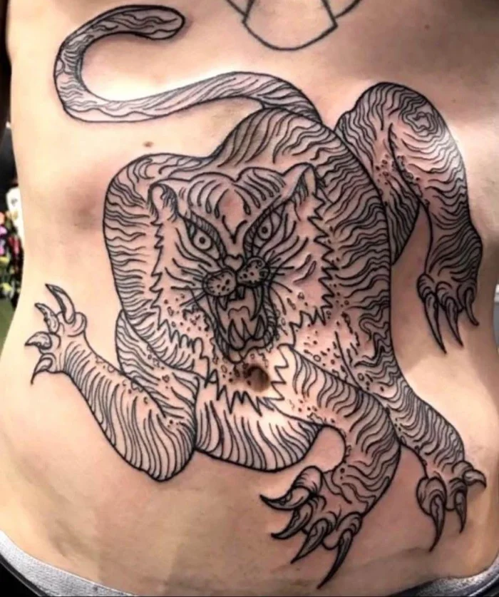 Когда креатив зашкаливает: 17 странных и гениальных татуировок